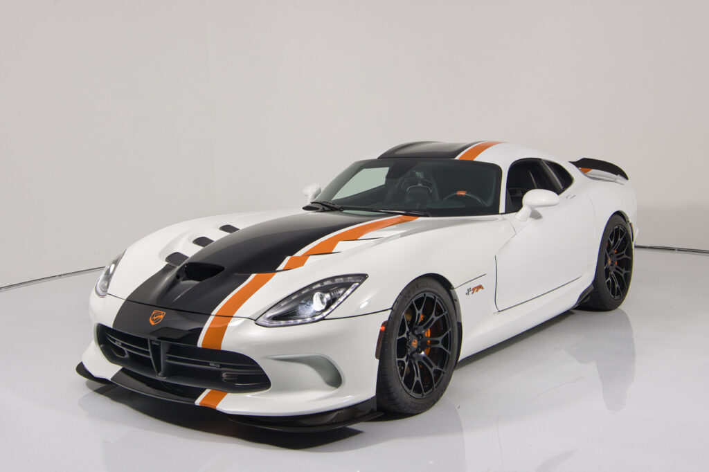Orange McLaren in a studio